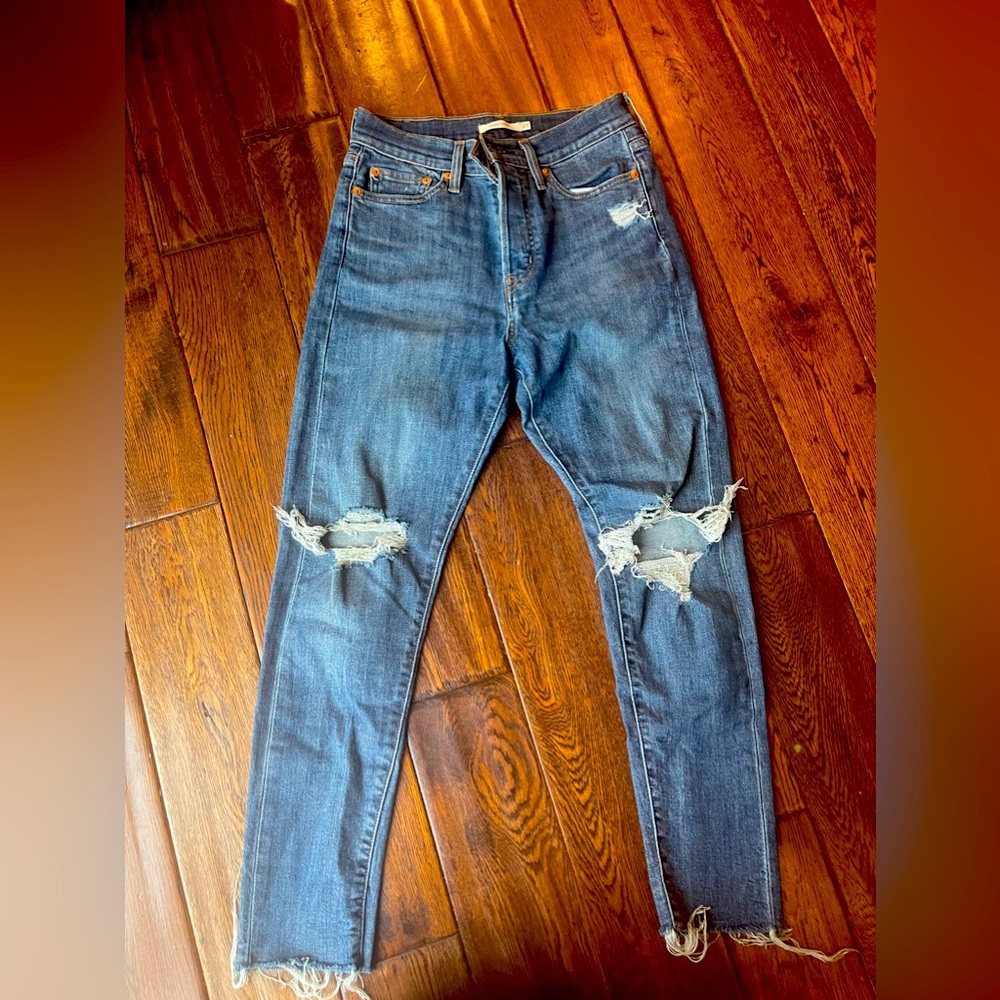 Levi’s button fly distressed jeans